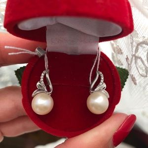 Pearl set: ring and earrings